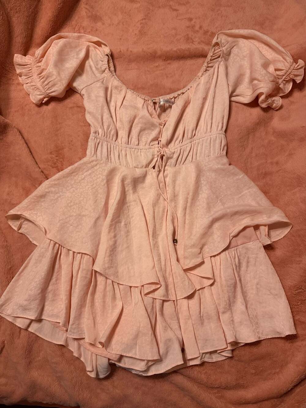 Saints + Secrets pink tiered ruffle romper